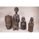 A collection of three African carved hardwood female figures and an African mask, largest 18" x 6"