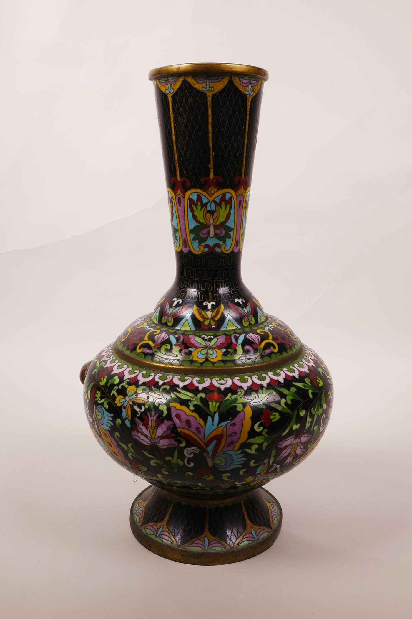 A Chinese black ground cloisonné vase, decorated with butterflies and lotus flowers, A/F repair, 12" - Image 2 of 5