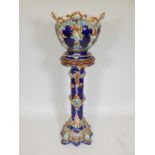 A Majolica Minton style jardiniere and stand, 50" high