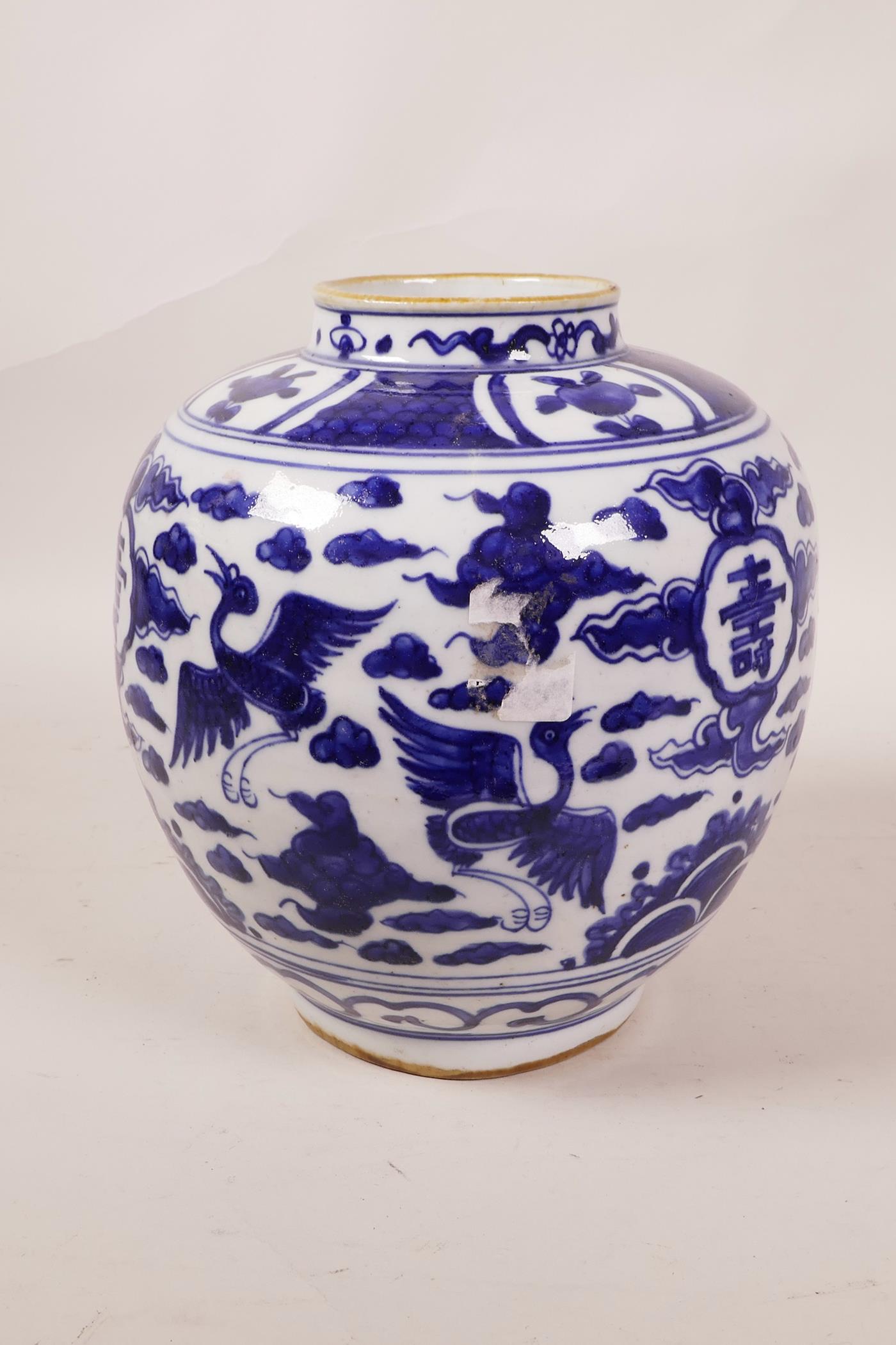 A Chinese blue and white porcelain ginger jar decorated with cranes in flight and auspicious - Image 4 of 5