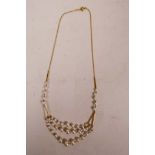 A 9ct gold and graduated pearl necklace, 14½" long