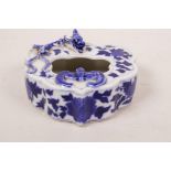 A Chinese blue and white porcelain ink pot with applied dragon and bat decoration, 4½" x 4"