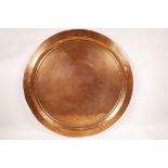 A large copper tray, 23" diameter