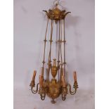 A C19th French Empire style ormolu bronze six branch chandelier, early C20th, 38" long