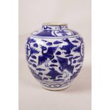 A Chinese blue and white porcelain ginger jar decorated with cranes in flight and auspicious