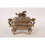 A Chinese silvered metal two handled censer with a pierced lid and dragon decoration, 6 character