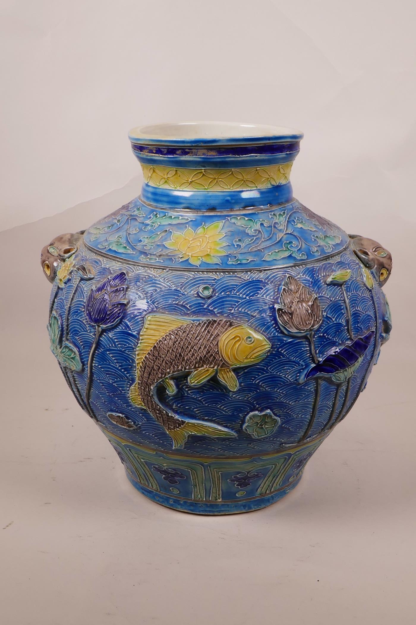 A large Chinese blue ground jar with two mask handles, the body with raised carp decoration, 8 - Image 2 of 7