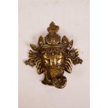 A North Indian bronze mask of Ganesh, 5½" x 6"