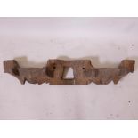 A C19th Portuguese carved wood ox yoke, 44" wide