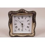 A contemporary silver framed mantel clock, 5" square