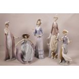 Four Lladro porcelain figurines of ladies, tallest 14", and a figurine of a young girl and goose (