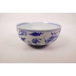 A Chinese blue and white porcelain bowl decorated with a dragon chasing the flaming pearl, 6