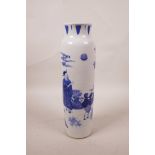 A Chinese blue and white porcelain cylinder vase decorated with figures in a landscape, 10½" long