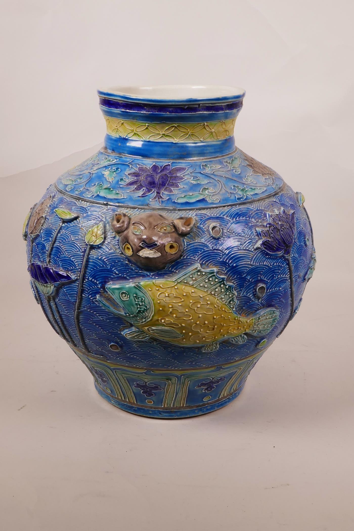 A large Chinese blue ground jar with two mask handles, the body with raised carp decoration, 8 - Image 3 of 7