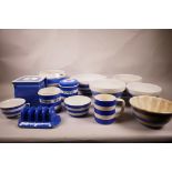 Thirteen pieces of T.G. Green and Co. Cornish ware, blue and white, to include various mixing