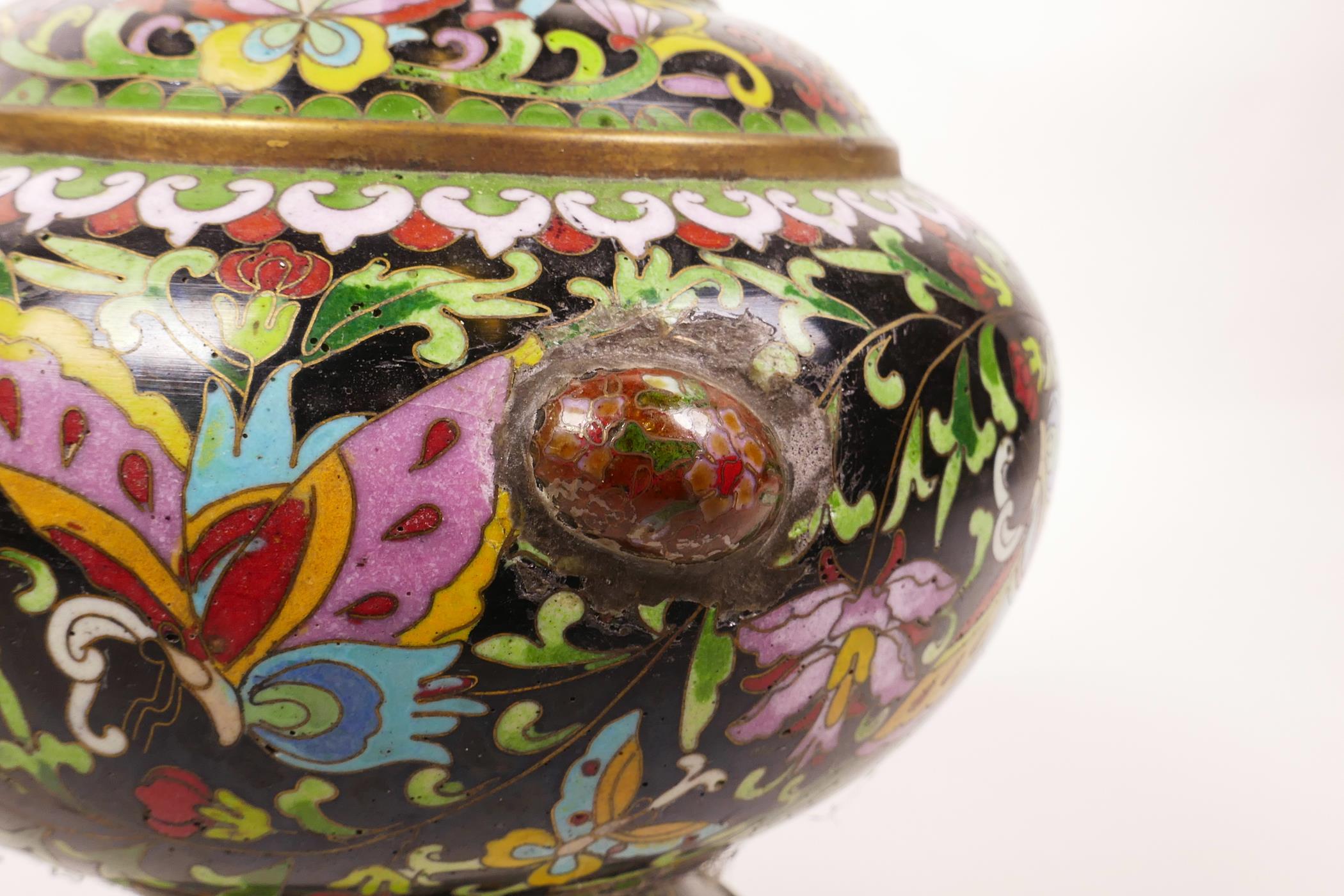 A Chinese black ground cloisonné vase, decorated with butterflies and lotus flowers, A/F repair, 12" - Image 4 of 5