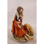 A Capodimonte Cortese figurine of a seated lady with a lamb, signed 326 on the back, with blue 'N'