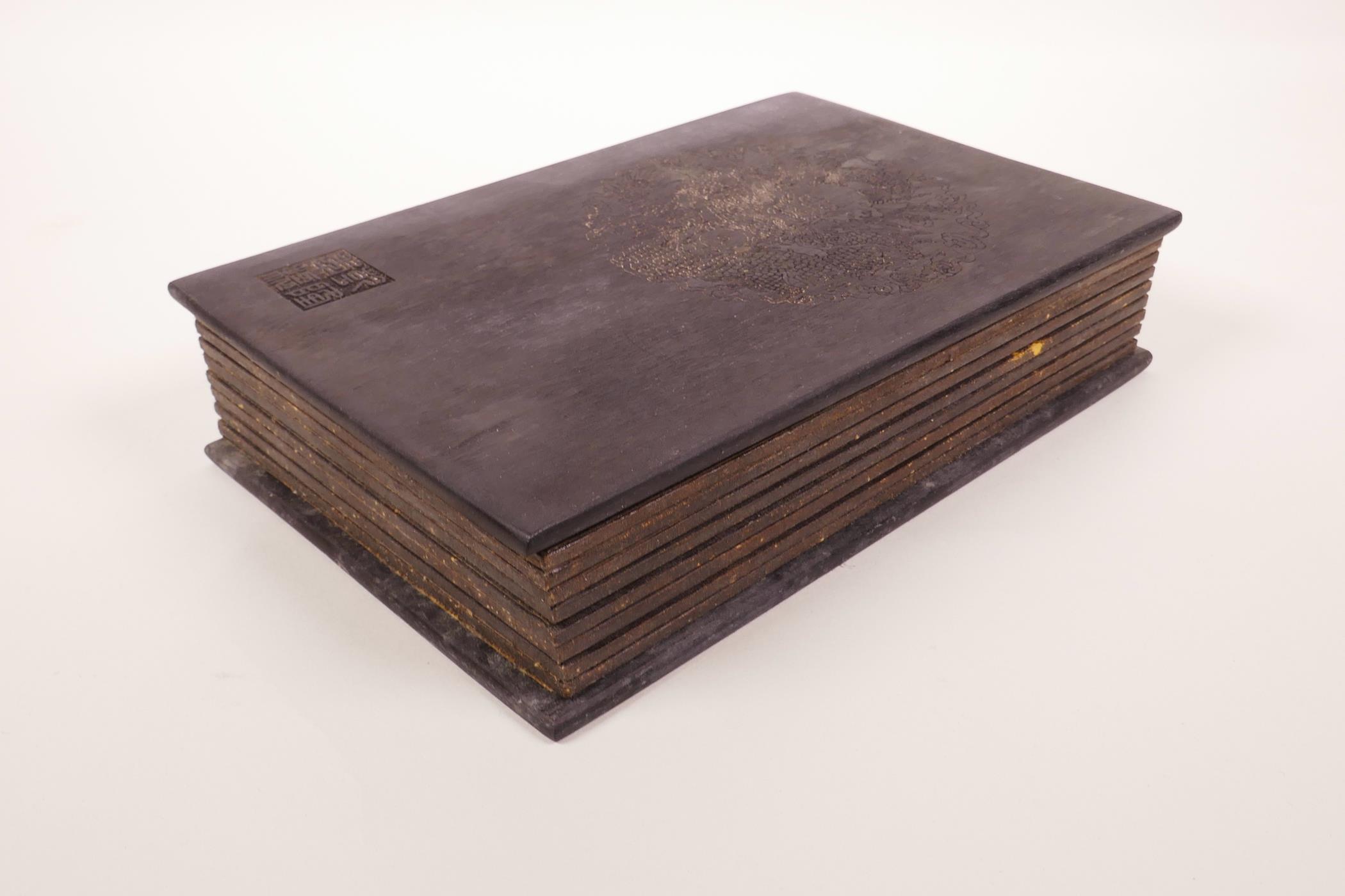 A Chinese silk and hardwood bound book containing white jade tablets with engraved and gilt - Image 7 of 7