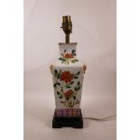 A C19th Chinese famille verte vase with two mask handles, and enamel floral decoration, converted to
