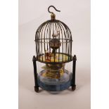 A brass birdcage automaton clock, 7" high