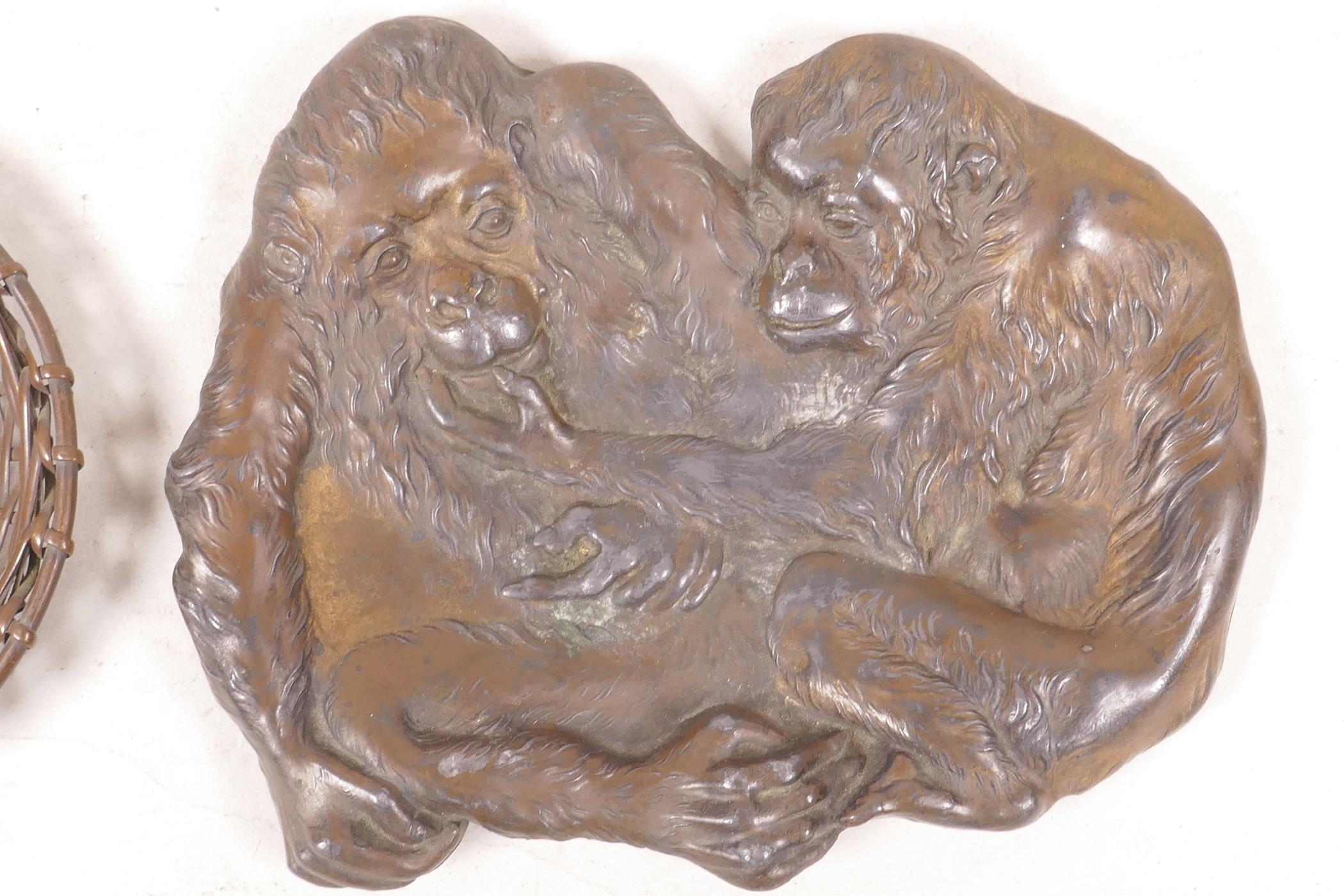 A Japanese Meji bronze shallow dish in the form of two monkeys, together with a Meiji woven bronze - Image 2 of 3