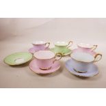 A 1930s Paragon China part tea set, sponged pastel colours of pink, lilac, green and blue, with gilt