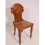 A mahogany hall chair with later painted rowing theme decoration, 32" high