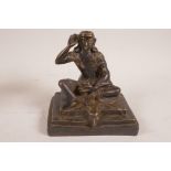 A Chinese bronze figurine of Buddha seated in meditation on a goat skin, 6" high