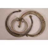 Three Tibetan torc necklaces, largest 7½" diameter