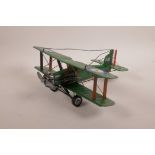 A tin plate model of a WWI biplane, 12½" x 11½"