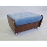 A mid century teak pouffe with a blue velvet button top, 25" x 21", 13" high