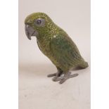 A cold painted bronze figurine of a green parrot, in the manner of Bergman, 6" high