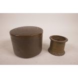 An Indian bronze pot and cover with hammered decoration, and another smaller pot, largest 4"