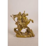 A Chinese gilt metal figure of a mounted warrior, 7½" high