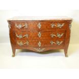 A French mahogany three drawer serpentine fronted commode with tulipwood parquetry inlay, brass