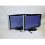Two Hitachi 42PD97OOU plasma televisions with remote controllers
