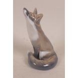 A Royal Copenhagen porcelain figurine of a fox, no.1475, 6" high