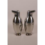 A pair of novelty cocktail shakers in the form of penguins, 7½" high