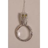 A 925 silver magnifying glass pendant necklace with owl decoration, 2" pendant
