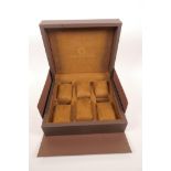 A Constantin Weisz leather watch display box, fitted for six watches, 9" x 8" x 3½"