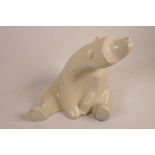 A stylised plaster figurine of a polar bear, 11½" high
