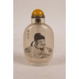 A Chinese reverse painted glass snuff bottle decorated with the portrait of an emperor,