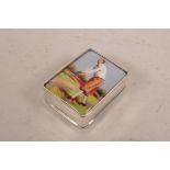 A 925 silver pill box set with a cold enamel plaque of a golfer, 1"