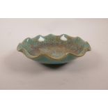 A Chinese shallow pottery dish with turquoise speckle glaze, 6" diameter