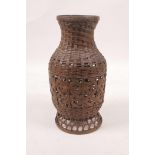 A Japanese Meiji ikebana bronze basket vase, 7½" high