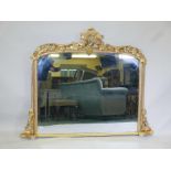 A large Victorian giltwood overmantel mirror with grape and vine decoration, 64" x 51½"
