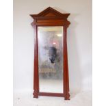 A C19th mahogany pier glass, with classical pediment and dentil cornice, with bevelled mirror, 65" x