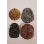 Four Chinese hardstone pendants with carved decoration of carp, Buddha, Quan Yin etc, largest 2"