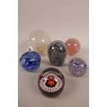 Six paperweights, including Caithness 'Red Rose', 'Avondale Glass', Adrian Sankey and rose quartz,