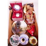 A box of miscellaneous items including a Thai puppet figure, Delft vase etc